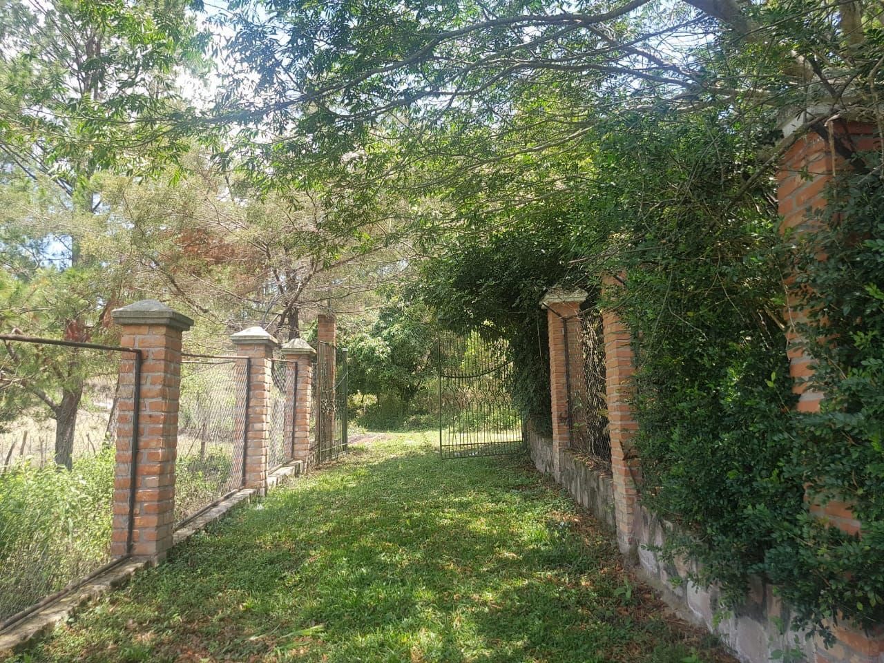 Terreno de 7,485.82 varas² en Valle de Ángeles